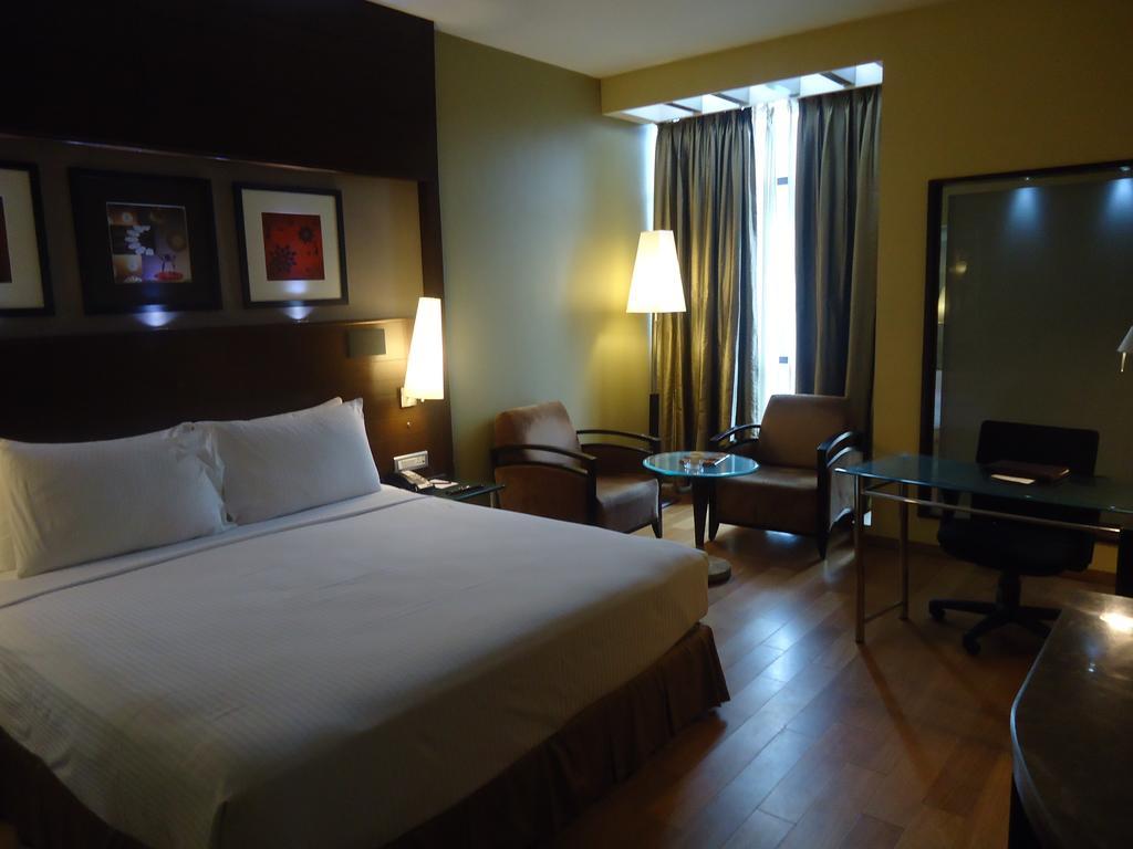 Radisson Blu Atria Bengaluru Hotel Екстериор снимка A room at the hotel